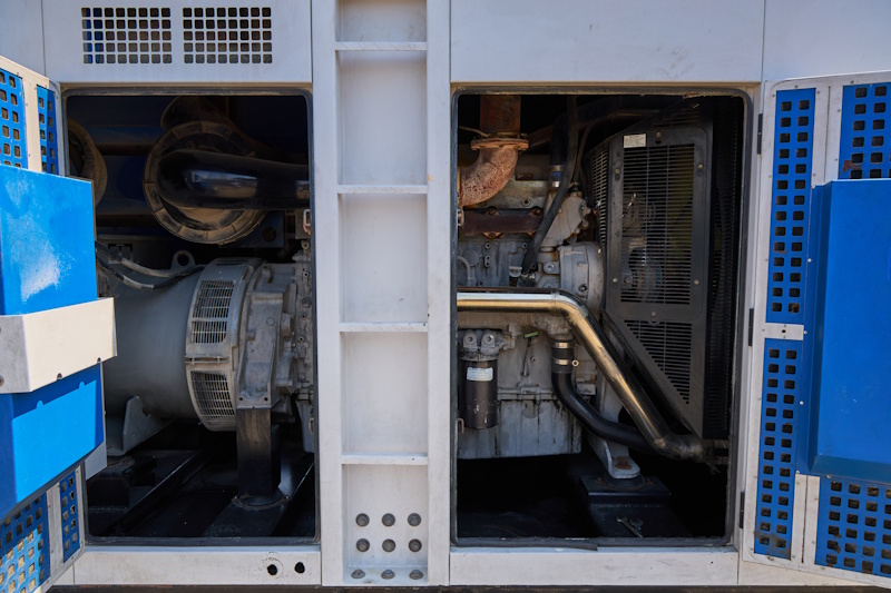 Internal view of Al Tamam heavy diesel engine and Leroy Somer alternator